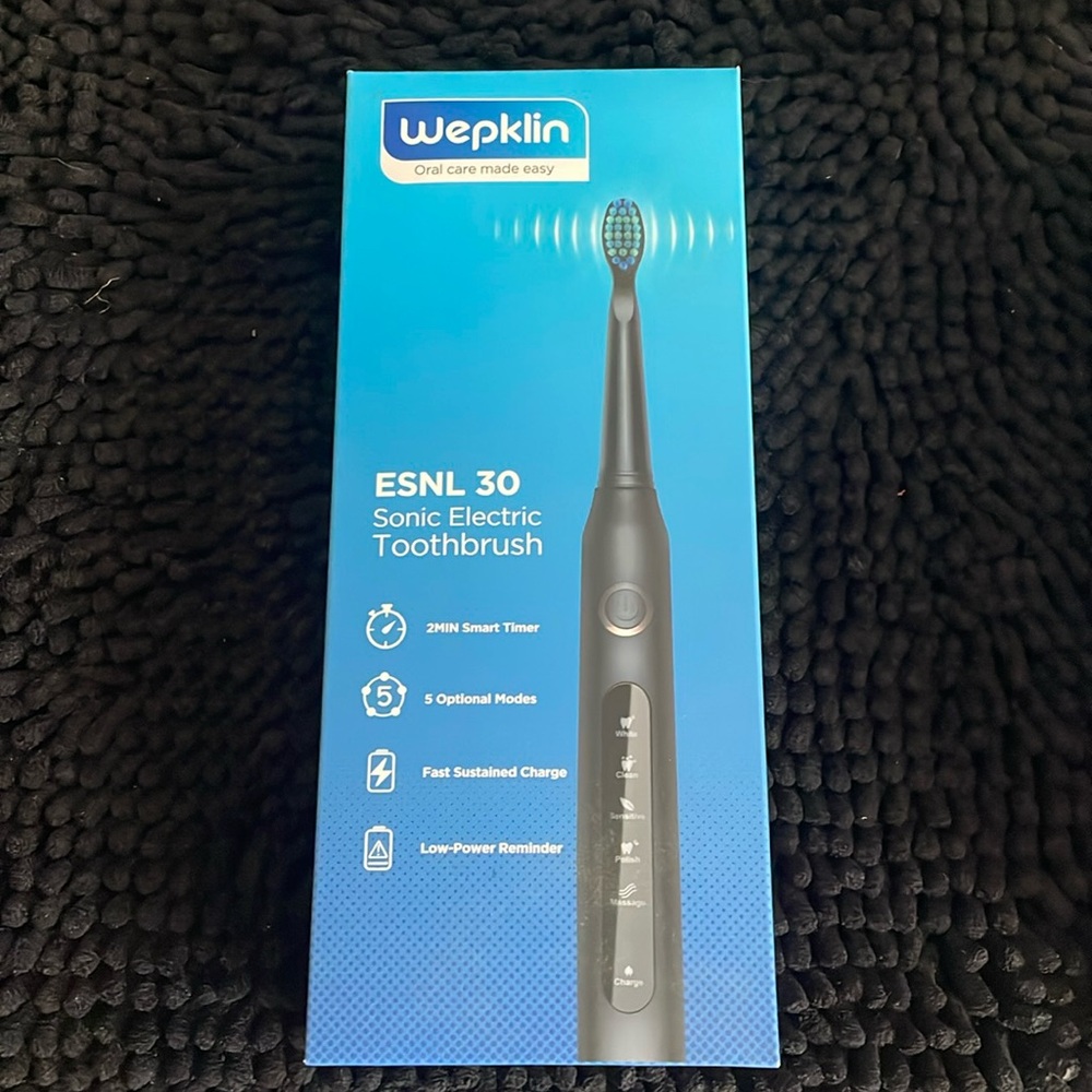 Sonic electric toothbrush package was open to make sure all items included!